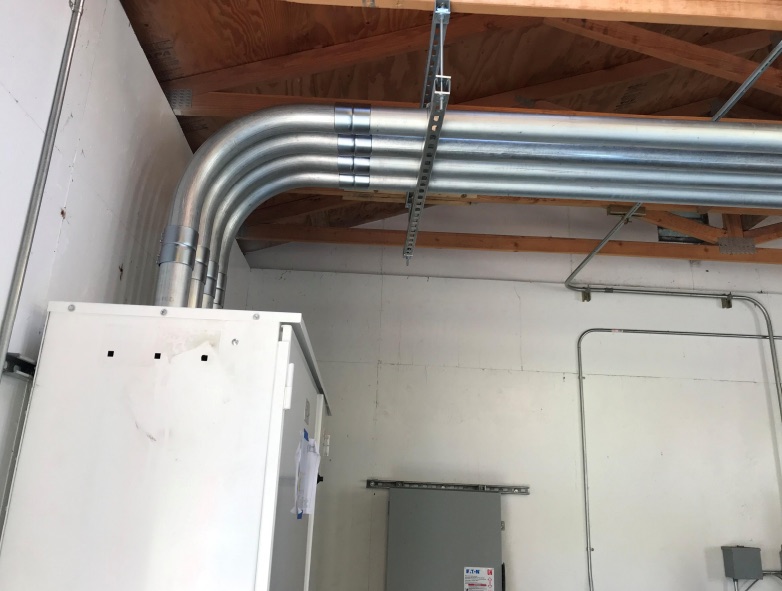 Large conduit installation serving facility equipment